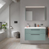 Vanity Unit Sizes: A South African Guide Wall-hung two-drawer vanity unit with integrated basin, mirror cabinet and wall-hung toilet in a modern bathroom