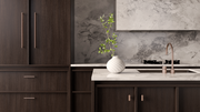 Meir kitchen tapware in a dark timber kitchen with marble splashback