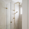 Meir shower rail set in a tiled shower enclosure