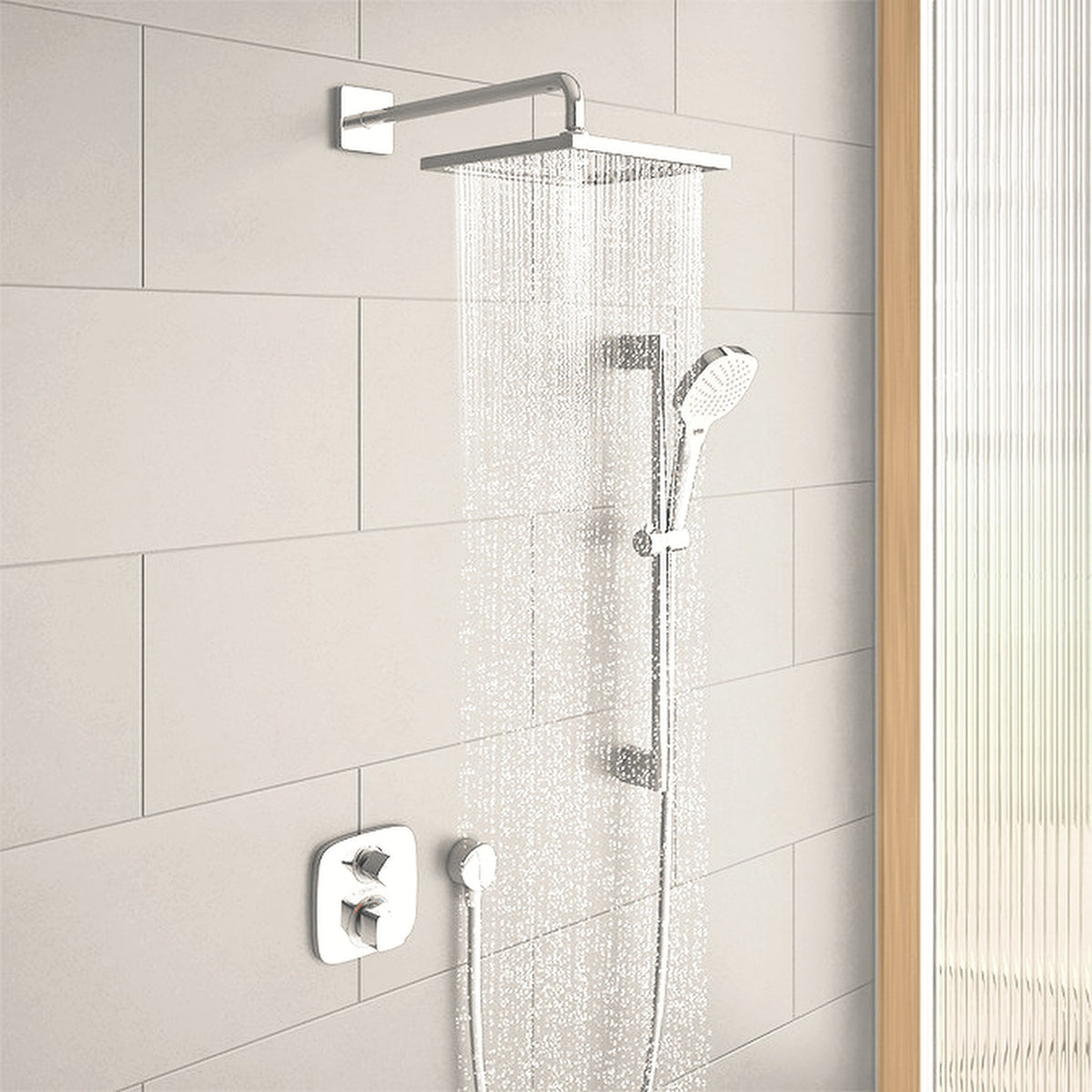 Rain shower, hand shower on a slide rail and thermostatic mixer on warm stone tiles with pale oak trim