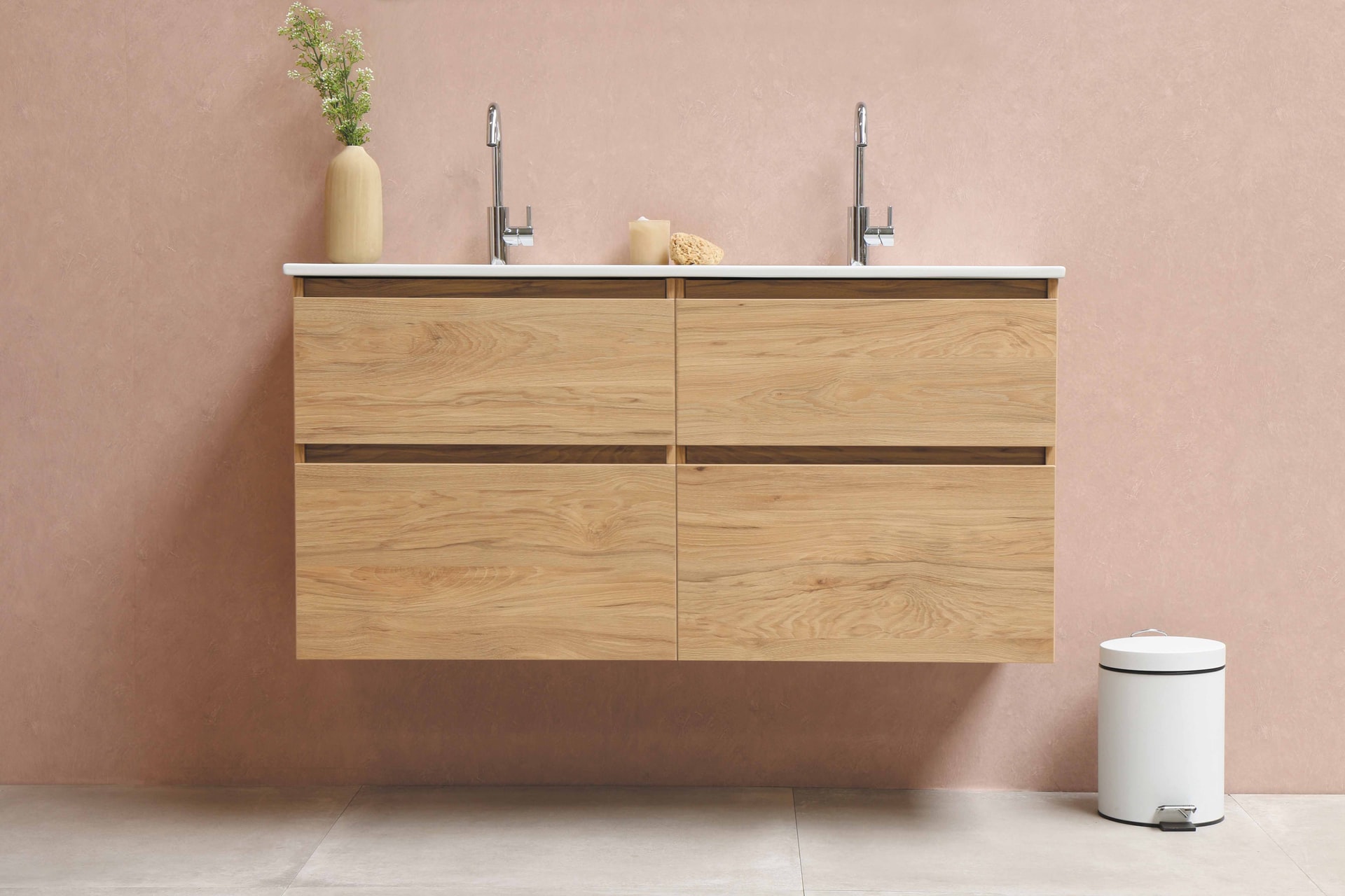 A wooden bathroom cabinet set built into the general design of the room