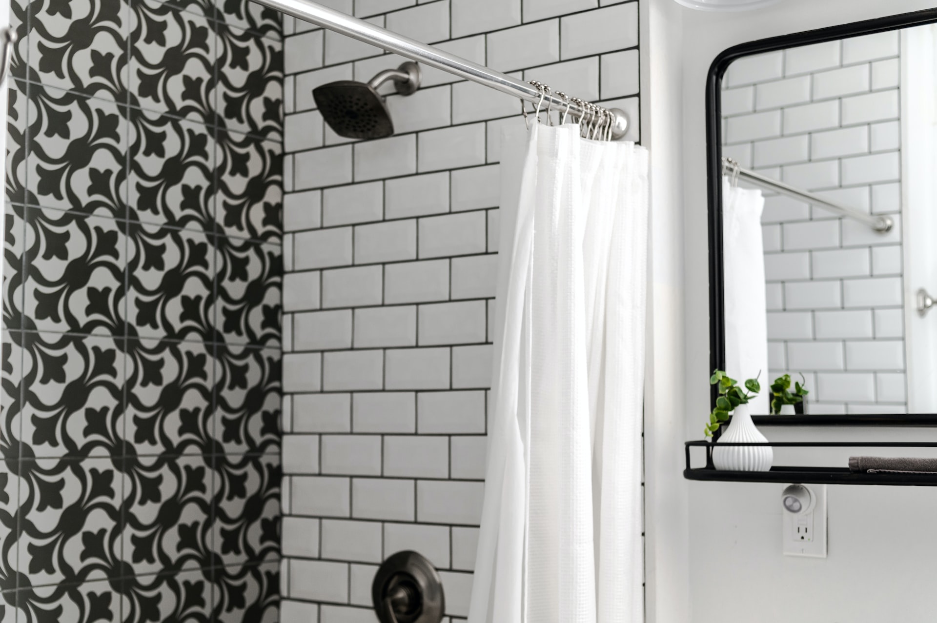 A modern bathroom with a black shower head, elevating the space